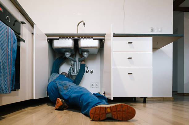 Professional Emergency Plumber technician working in Callaway, FL